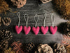 Set of five Wild Rose Pink needle-felted wool heart ornaments with cotton string loops