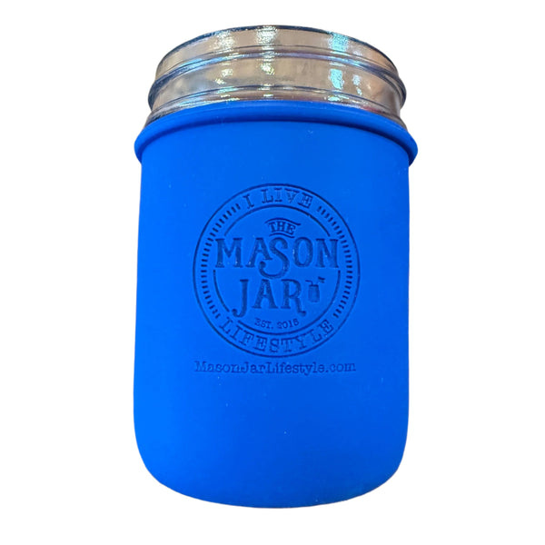 Blue mason jar with silver lid on a white background