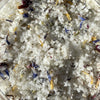 Close-up of Jo's Flower and Herb Foot Soak showing Dead Sea salt blend with dried flower petals and herbs