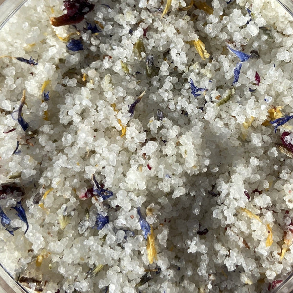 Close-up of Jo's Flower and Herb Foot Soak showing Dead Sea salt blend with dried flower petals and herbs