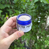 Clay detox mask being applied to face for skin-clearing and pore-tightening