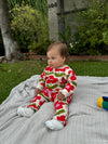 Close-up of Mon Coeur baby sweatshirt floral print and ribbed cuff detail in recycled cotton fleece