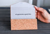 Cork folding sunglasses case holding a pair of sunglasses, one size fits all