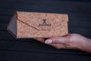Joycoast cork folding sunglasses case open showing microfiber lining and motivational mantra