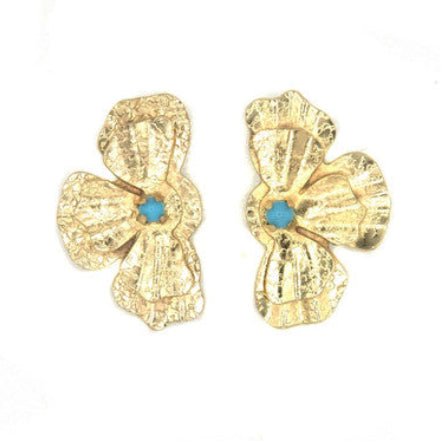 Gold flower-shaped earrings with turquoise centers on a white background