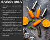 Orange popsicles with metal molds on a dark surface, accompanied by cleaning instructions.