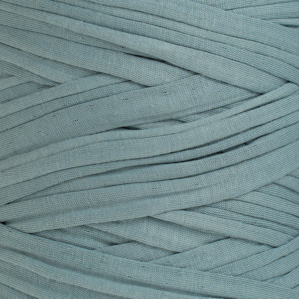 Close-up of Jade recycled cotton fabric yarn showing texture, width and colour detail