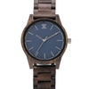 Joycoast wooden watch with blue face and dark sandalwood band on wrist