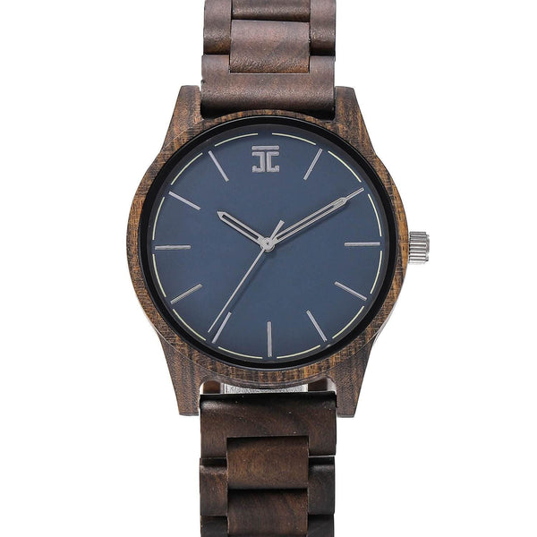 Joycoast wooden watch with blue face and dark sandalwood band on wrist