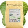 Flawn Seed Kits packaging with a label on a grassy background. Get a beautiful, low-maintenance lawn with our Mow Less Grass Seed blend. This non-GMO, drought-tolerant and kid-friendly fine fescue mix reduces mowing and is perfect for an eco-friendly yard.