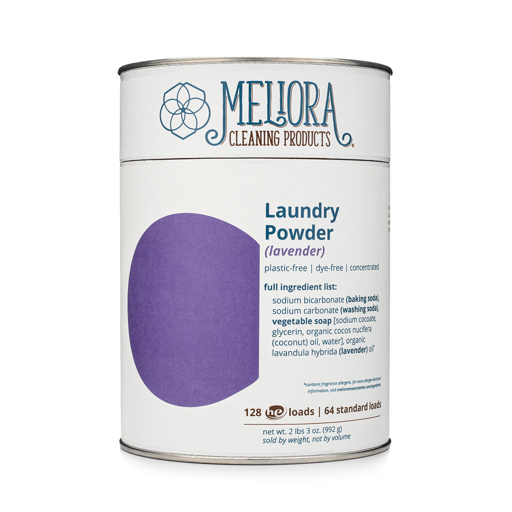 Meliora Laundry Powder Detergent lavender scent in a paper-and-steel canister with stainless steel scoop