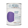 Meliora Laundry Powder Detergent lavender scent in a paper-and-steel canister with stainless steel scoop