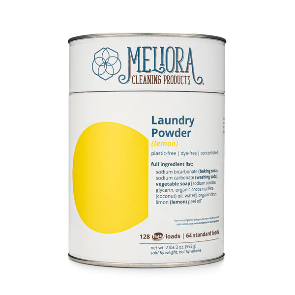 Meliora Laundry Powder Detergent lemon scent in a paper-and-steel canister with stainless steel scoop