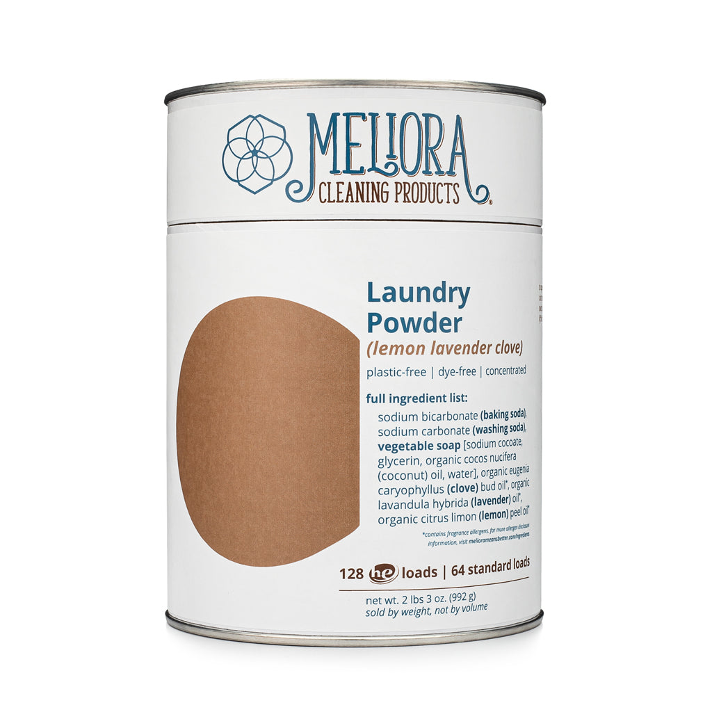 Meliora Laundry Powder Detergent lemon-lavender clove scent in a paper-and-steel canister with stainless steel scoop