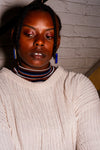 Close-up of Fair Anita lapis drop earrings showing natural blue lapis lazuli stone and gold-plated recycled brass detail
