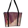 Carry all your essentials in style with our Large Tote Bag. Made from upcycled banners and crafted in Peru, this sustainable and unique bag is perfect for everyday adventures.