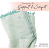 Light blue towel with frayed edges on a white background, featuring text about support and comfort.