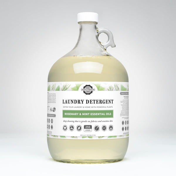 Rustic Strength Rosemary and Mint liquid laundry detergent in a gallon jug