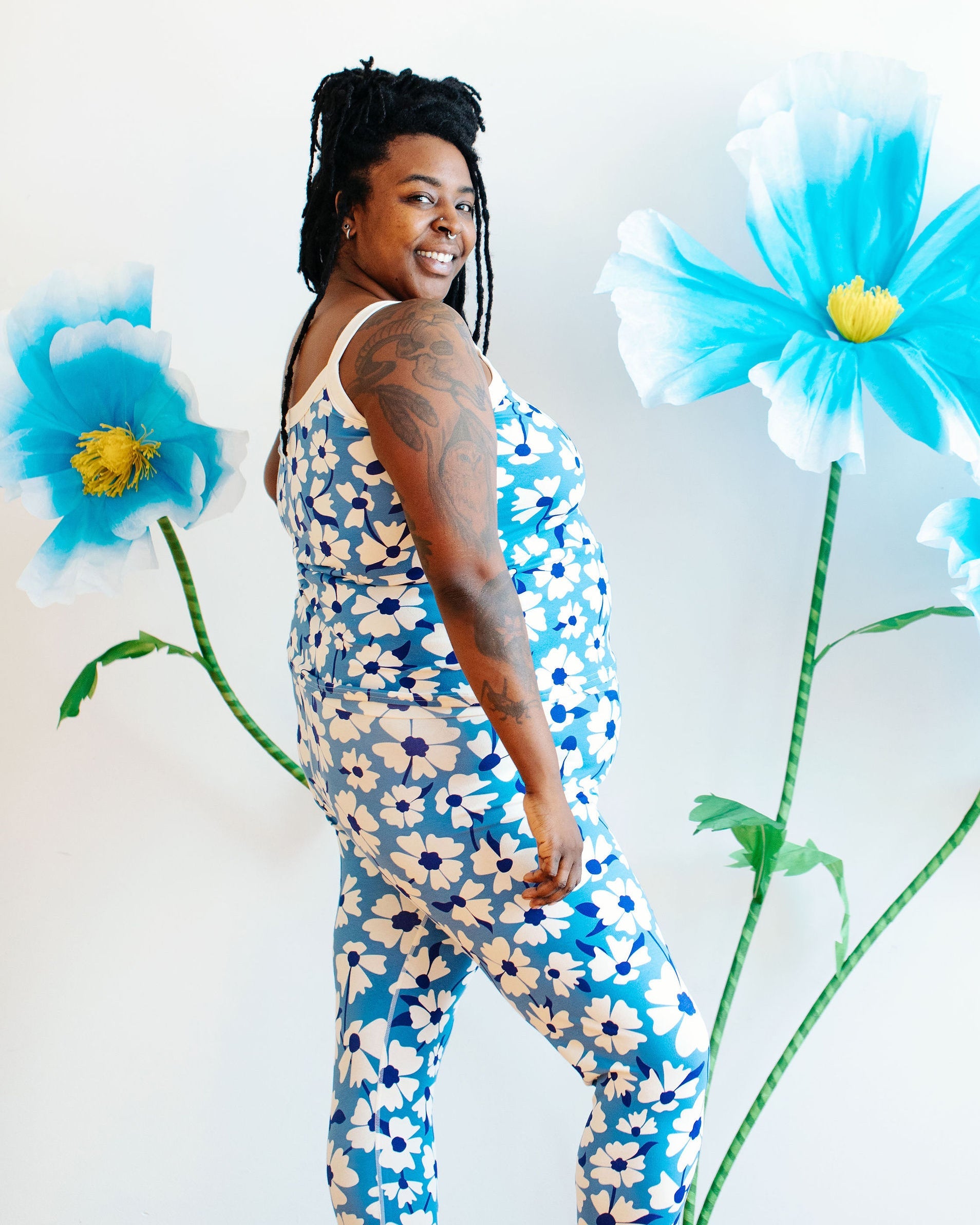 Side view of Thunderpants Moody Blooms high rise extra long leggings