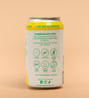 A 12 fl oz can of Good Mood Kombucha on a solid peach background. The can features a white label with green text and icons, and yellow accents at the top and bottom.