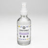 Rustic Strength Lavender and Lemon Linen Spray 4 oz bottle on a clean white surface