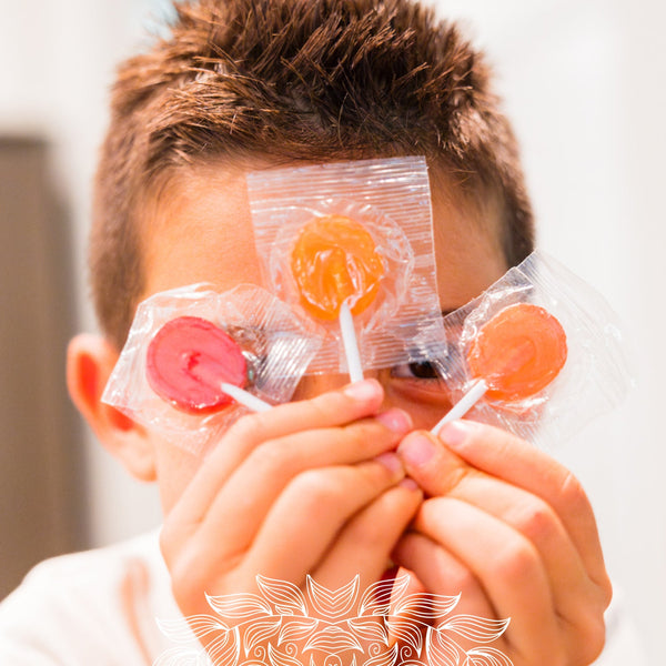 Kids enjoying Organic Lollipops as an on-the-go sweet treat