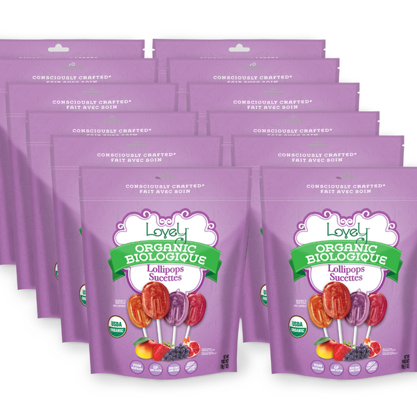 Multiple packages of Lovely Organic Biologique lollipops on a white background