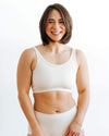 Model wearing Thunderpants Black Longline Bra, front fit view