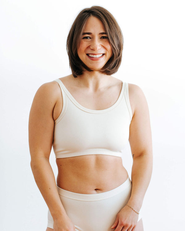 Model wearing Thunderpants Black Longline Bra, front fit view