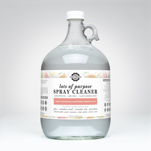 Bottle of 'Lots of Purpose Spray Cleaner' on a white background