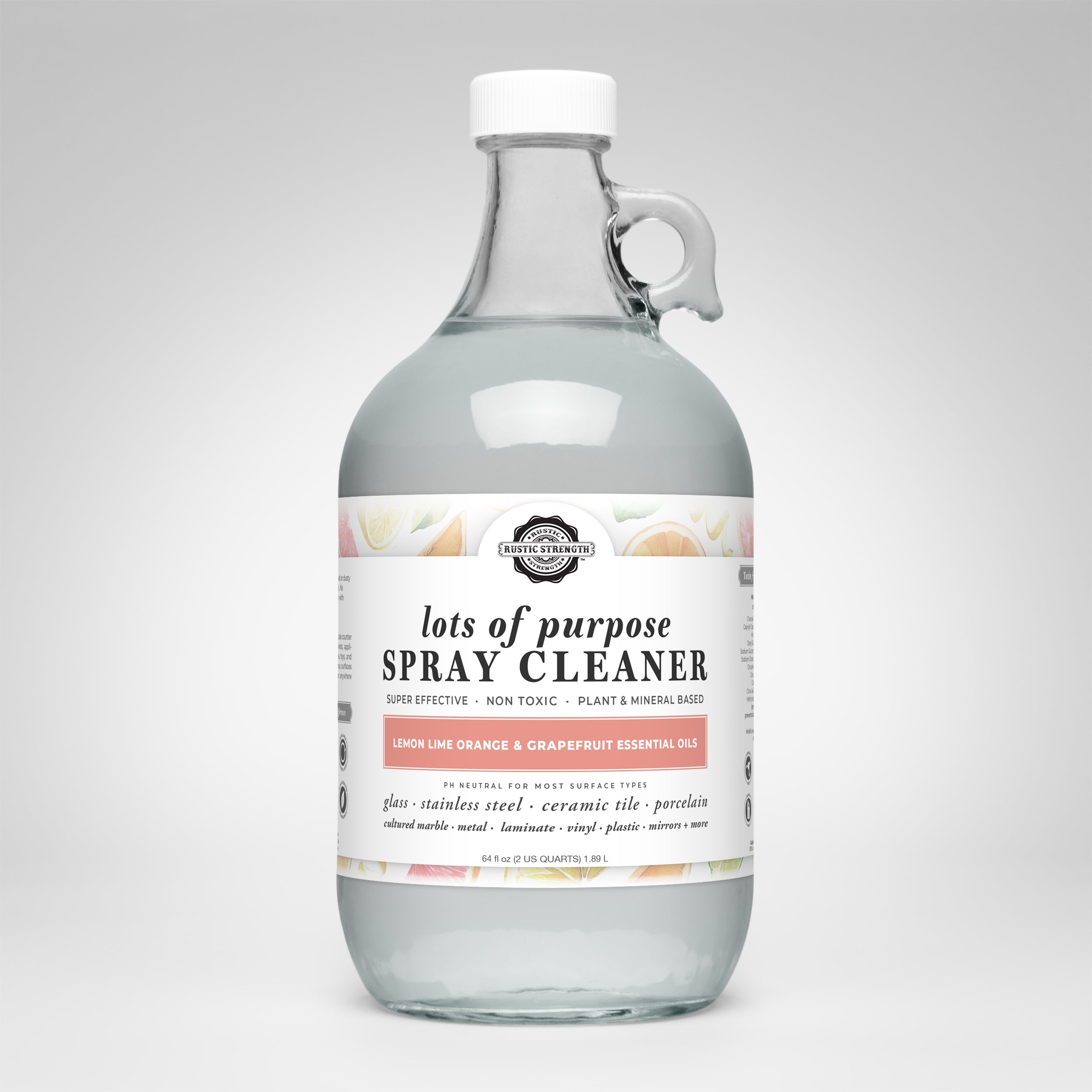 Clear spray cleaner bottle with a label on a white background