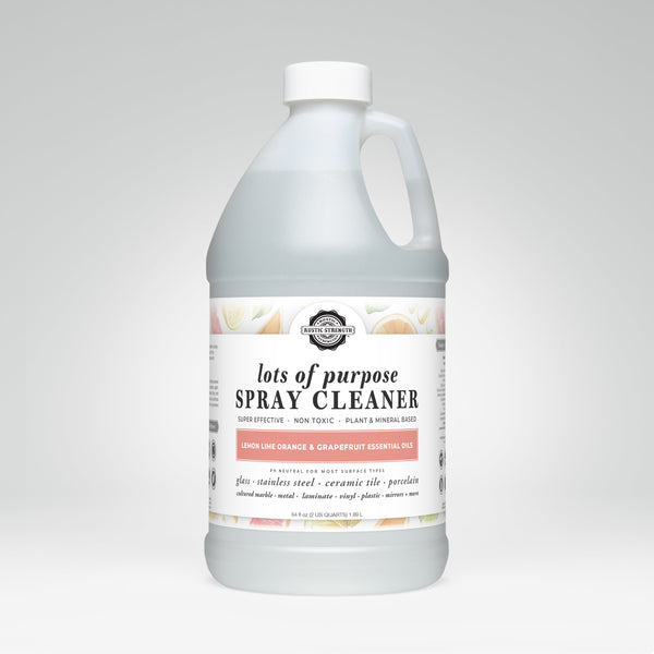 Gallon bottle of 'lots of purpose' spray cleaner on a white background