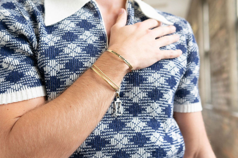 Twisted Cuff bracelet styled on wrist, brass-plated fair trade jewellery by Fair Anita