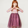 Child wearing the Mon Coeur Mini Hearts Tulle Dress, a tutu-inspired organic cotton kids' dress