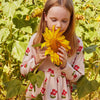 Close-up of watercolour floral print on girls organic cotton long sleeve dress