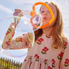 Child wearing organic cotton floral jersey dress with button-back detail