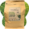 Flawn Seed Kits micro clover and mow less grass seed package with a grassy background