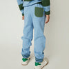 Mon Coeur Blue Jogger styled for children, featuring sporty green striped cuffs and a relaxed fit