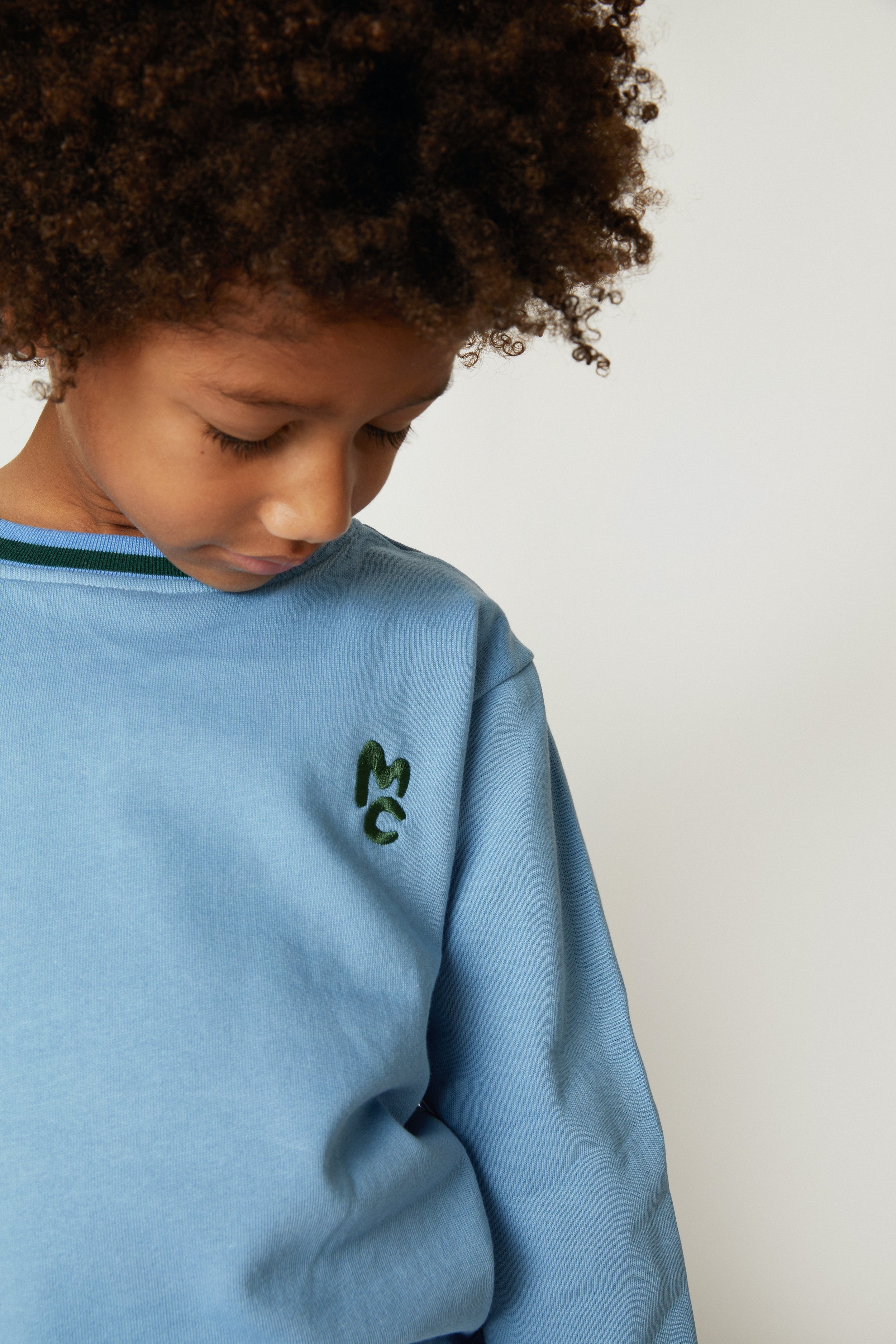 Mon Coeur MC Blue Sweatshirt styled on a child, sizes 1Y to 12Y