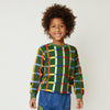 Child wearing the Mon Coeur Fall Grid Sweatshirt, a sustainable kids sweatshirt made in Portugal