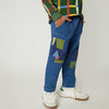 Mon Coeur unisex kids patched denim pant made from organic and recycled denim, front view