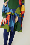 Children wearing the Mon Coeur Fall Shapes drop-waist dress with seasonal abstract graphic print