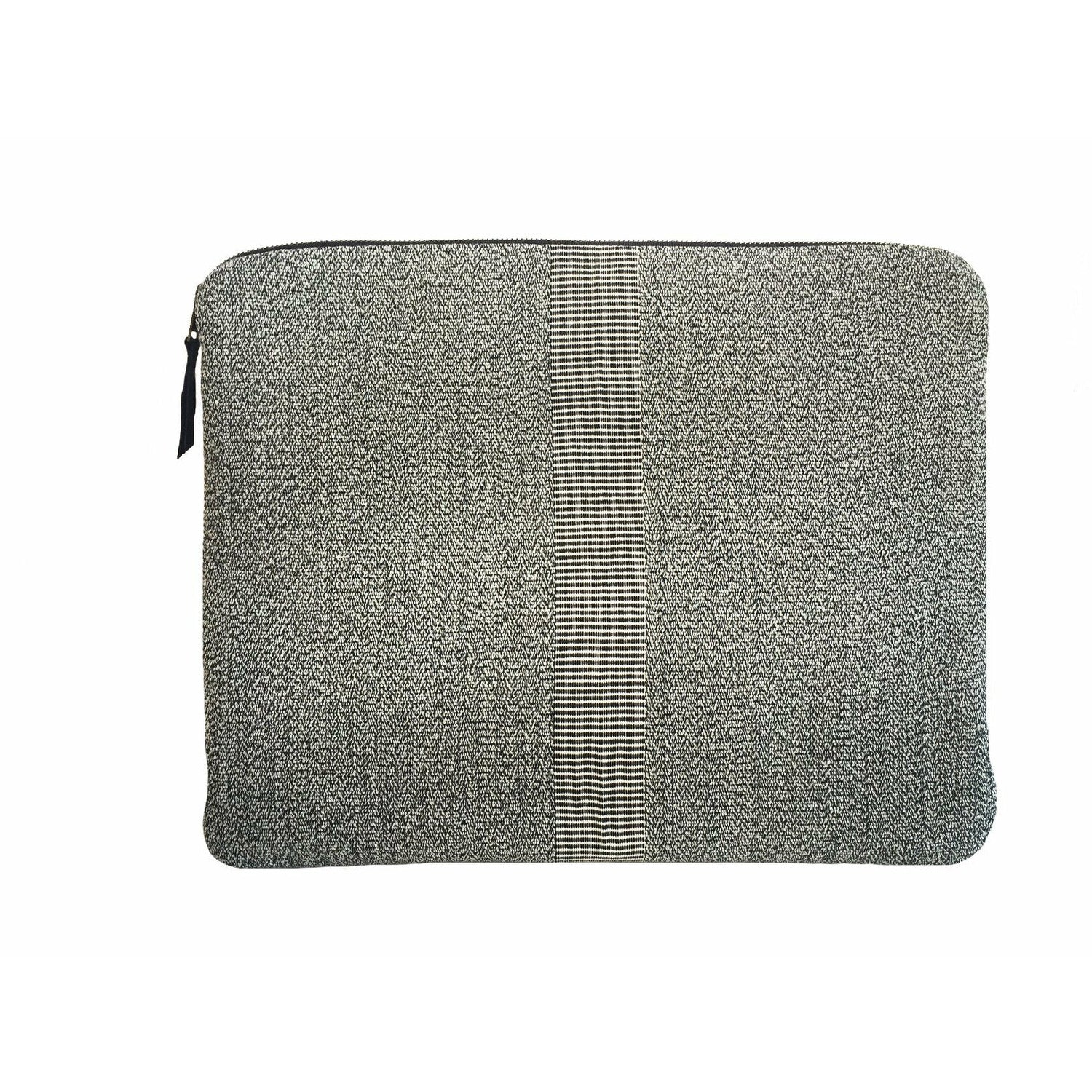 Close-up of Havana computer sleeve in charcoal showing corded stripe panel and fair trade craftsmanship
