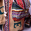 Mini Recycled Travel Backpack Delhi shown from a different angle highlighting its unique pattern