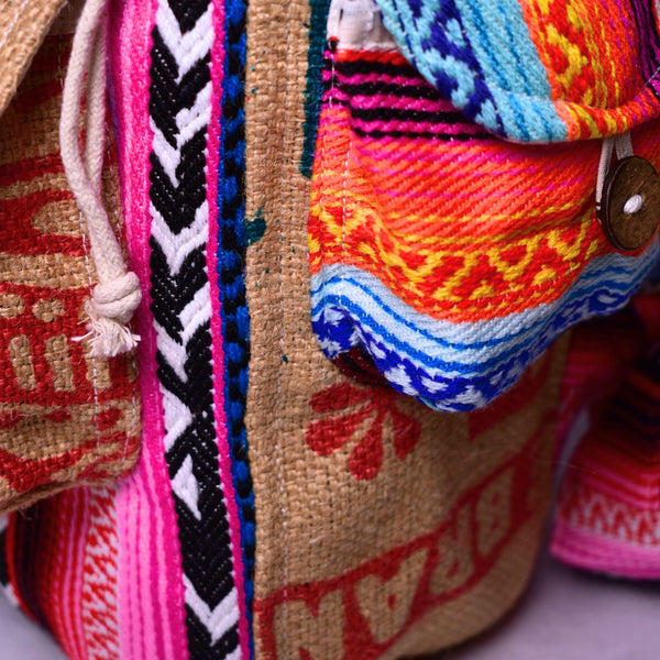 Mini Recycled Travel Backpack Ravi shown from a different angle highlighting its one-of-a-kind design
