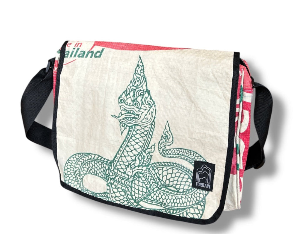Messenger bag with Thai dragon design and 'Made in Thailand' text on a white background