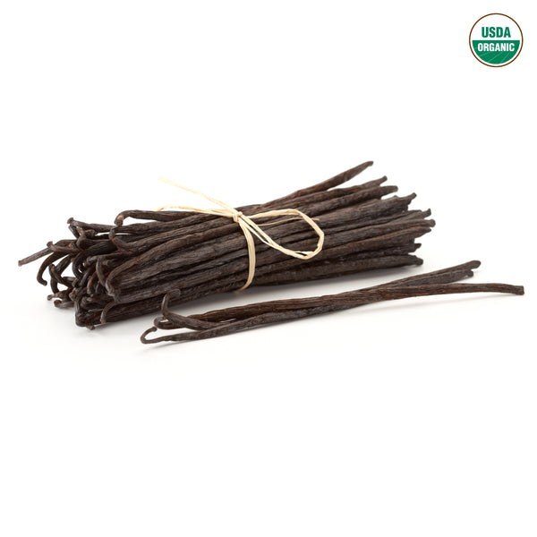 Bundle of vanilla beans with USDA Organic label on a white background. Craft your own gourmet vanilla extract with our USDA Organic Grade B Madagascar Vanilla Beans. These high-quality, non-GMO vanilla pods are a cost-effective way to get rich, creamy flavor for all your baking needs.