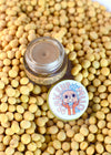 Makeup Mud jar next to packaging