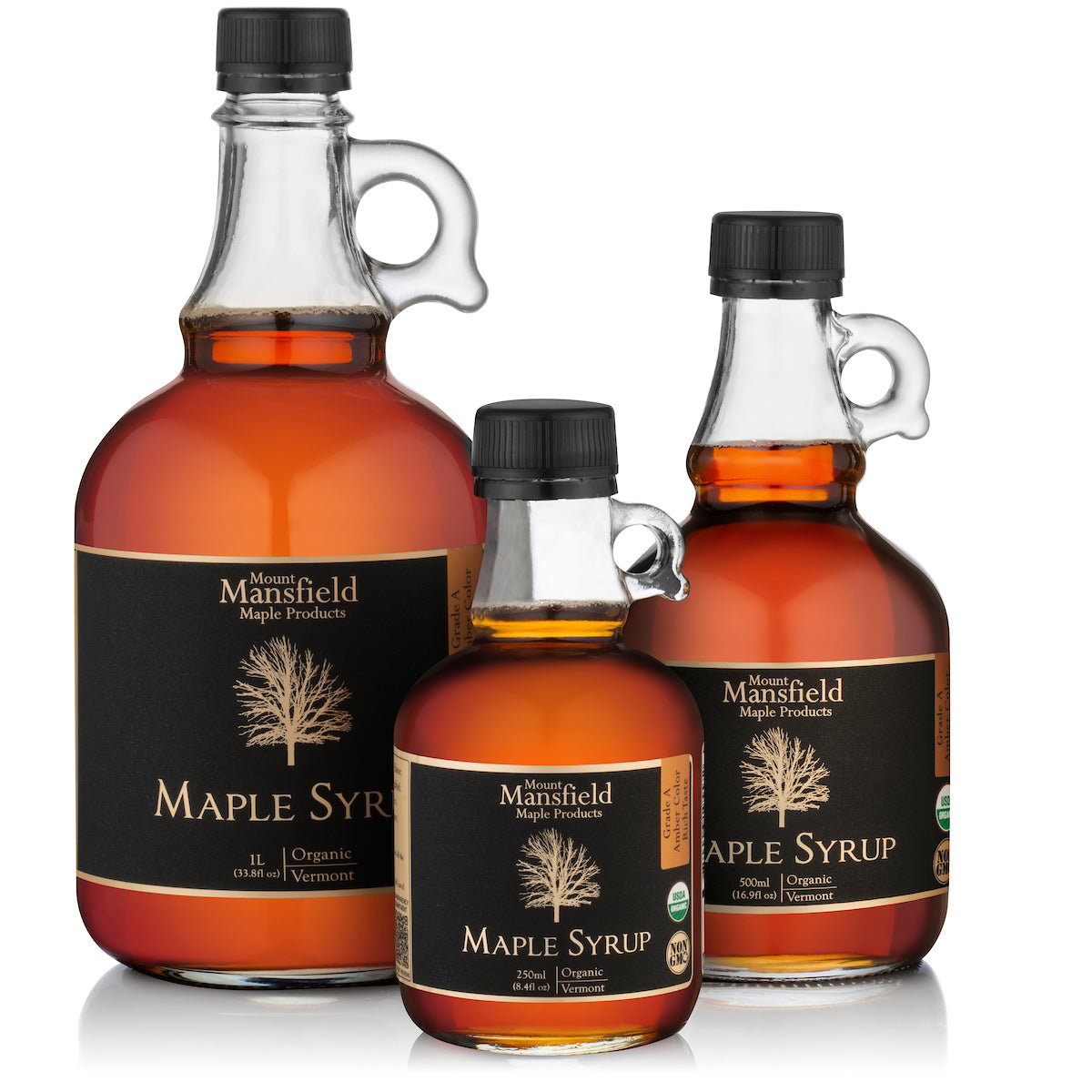 Glass bottles of Organic Pure Vermont Maple Syrup from Mansfield Maple