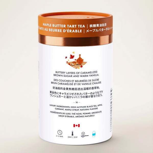 Maple butter tart tea canister with orange lid on a light beige background